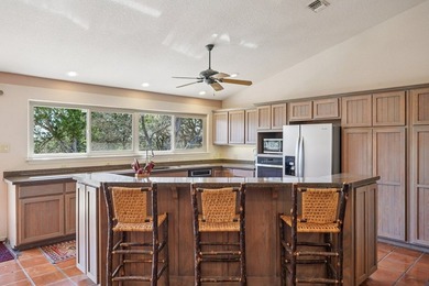 Set on a 1.93-acre tract in Canyon Springs Ranch with - photo 17