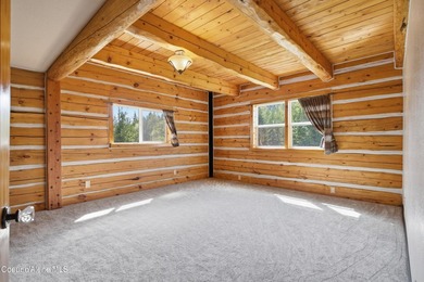 Escape to this mountain sanctuary located in Sagle, Idaho. This - photo 21