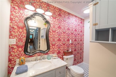 Step into timeless charm with this beautifully updated 1893 - photo 25
