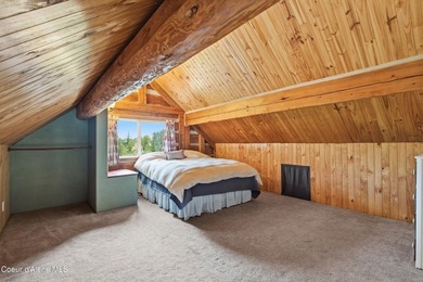 Escape to this mountain sanctuary located in Sagle, Idaho. This - photo 42