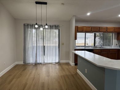 This 3-bedroom, 2-bath home features vaulted ceilings which - photo 2