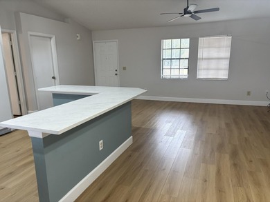 This 3-bedroom, 2-bath home features vaulted ceilings which - photo 4