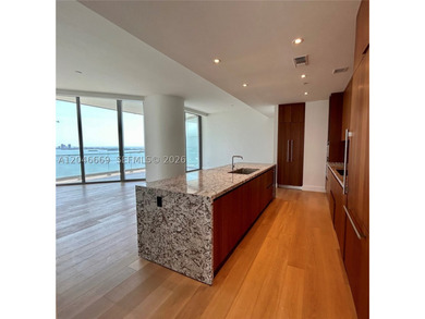 Experience elevated waterfront living at Una Residences in the - photo 3