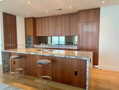 Experience elevated waterfront living at Una Residences in the - photo 5