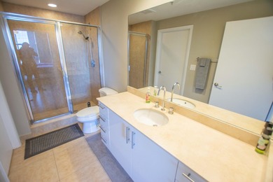 Enjoy beautiful city views from this residence in a full-service - photo 11