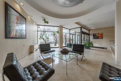 Welcome to Caribbean House, a boutique mid-rise complex on the - photo 21