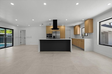 Welcome to this beautifully renovated 4-bedroom, 2-bathroom home - photo 3