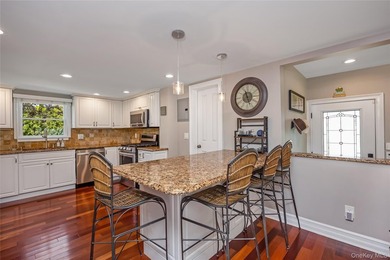 Welcome to this beautifully updated expanded Cape nestled in the - photo 11
