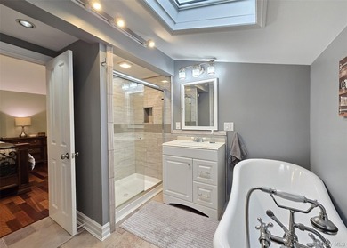 Welcome to this beautifully updated expanded Cape nestled in the - photo 20