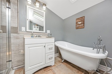 Welcome to this beautifully updated expanded Cape nestled in the - photo 21