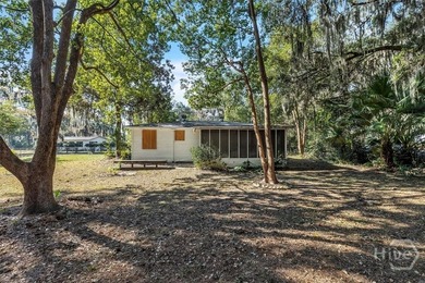 MOTIVATED SELLER! This cozy lakeside property sits on a generous - photo 22
