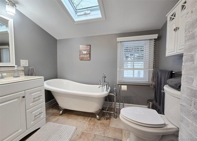 Welcome to this beautifully updated expanded Cape nestled in the - photo 22