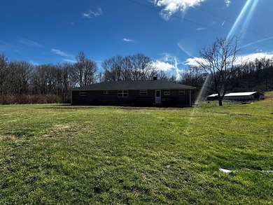 Tucked away on a beautiful 6-acre parcel, this charming - photo 32