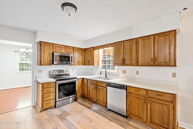 New roof! Seller offering a $5000 concession, come make this - photo 16