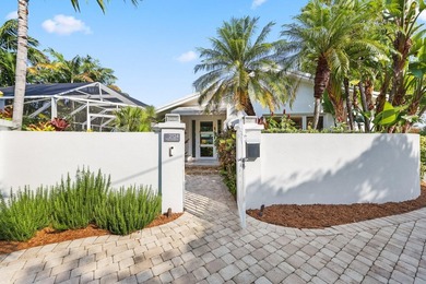 Set along 177' of maturely landscaped wide waterfront, 2124 - photo 3