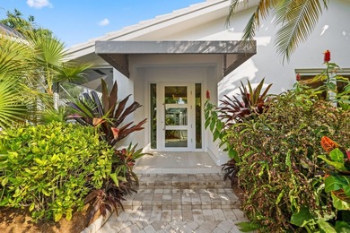 Set along 177' of maturely landscaped wide waterfront, 2124 - photo 4