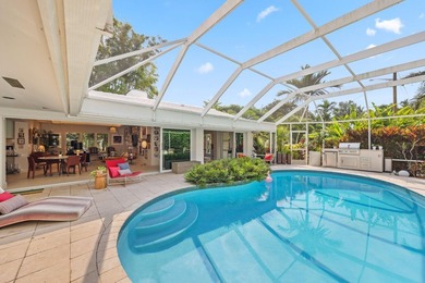 Set along 177' of maturely landscaped wide waterfront, 2124 - photo 6