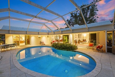 Set along 177' of maturely landscaped wide waterfront, 2124 - photo 7