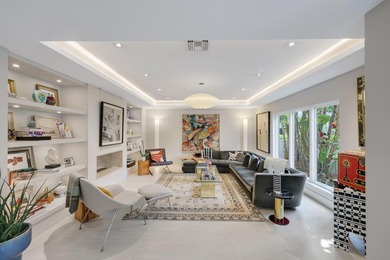 Set along 177' of maturely landscaped wide waterfront, 2124 - photo 8