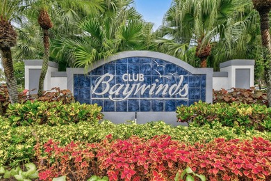 A MUST-See! This charming NEW 2025 ROOF and lakefront villa is - photo 1