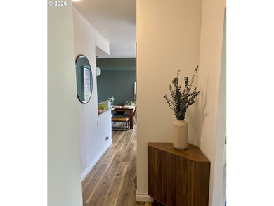 Overflowing with light, this corner condo is comfortable