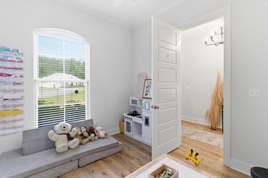 Welcome to this beautifully maintained 4-bedroom, 2-bath home in - photo 4