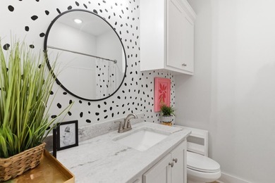 Welcome to this beautifully maintained 4-bedroom, 2-bath home in - photo 8