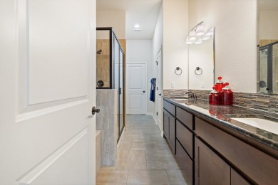 This immaculate 4-story townhome, ideally located on a quiet