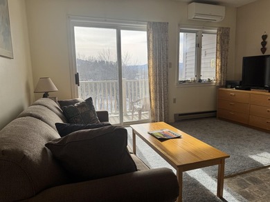 Wake up to front-row views of the South Peak ski slopes and the - photo 11