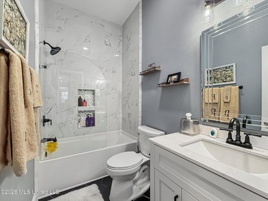 Welcome to this Riverfront gem on the Tchoutacabouffa! 3 Beds | - photo 12