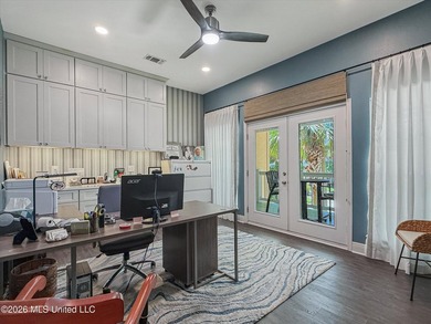 Welcome to this Riverfront gem on the Tchoutacabouffa! 3 Beds | - photo 13