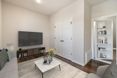 This immaculate 4-story townhome, ideally located on a quiet