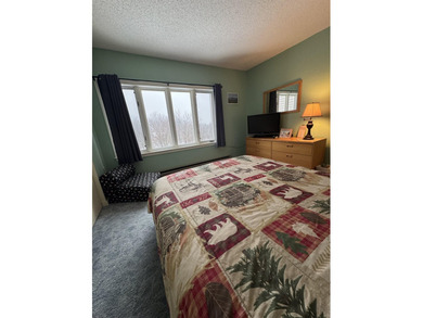 Wake up to front-row views of the South Peak ski slopes and the - photo 18
