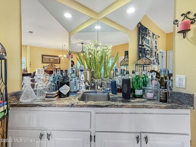 Welcome to this Riverfront gem on the Tchoutacabouffa! 3 Beds | - photo 19