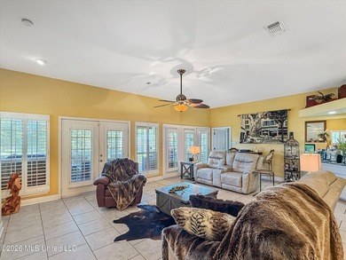 Welcome to this Riverfront gem on the Tchoutacabouffa! 3 Beds | - photo 20