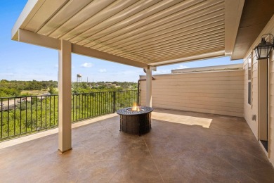 This immaculate 4-story townhome, ideally located on a quiet