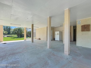 Welcome to this Riverfront gem on the Tchoutacabouffa! 3 Beds | - photo 25