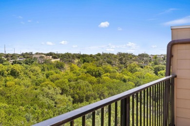 This immaculate 4-story townhome, ideally located on a quiet