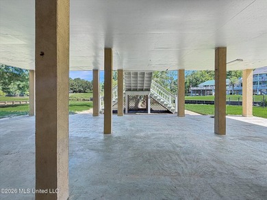 Welcome to this Riverfront gem on the Tchoutacabouffa! 3 Beds | - photo 26