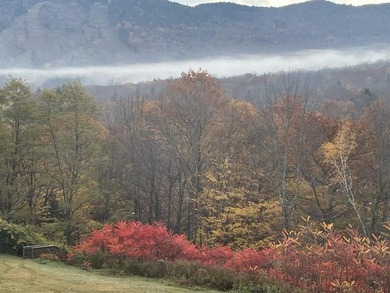 Wake up to front-row views of the South Peak ski slopes and the - photo 27