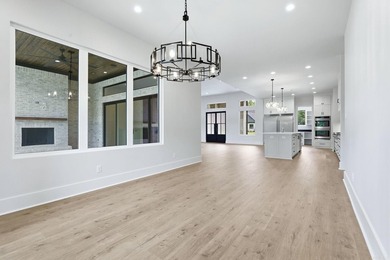 New construction by Dillon Homes in a gated subdivision along - photo 36