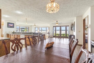 Welcome to the ultimate waterfront compound! This extraordinary - photo 9