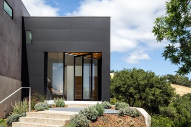 Set on a sprawling 2.02-acre lot with panoramic views of the - photo 2