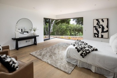 Set on a sprawling 2.02-acre lot with panoramic views of the - photo 8