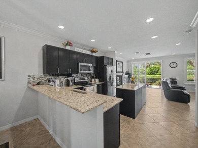 Experience elevated and tranquil waterfront living in this - photo 8