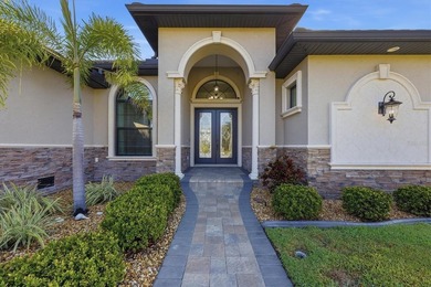 Welcome to SW Florida Living in this Exceptional Waterfront Pool - photo 3