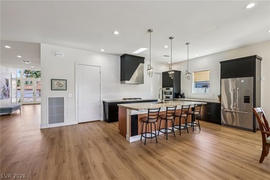 THIS CUSTOM SINGLE-STORY HOME OFFERS DESIGN UNDER 3.5 MILES FROM