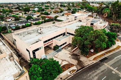 PRIME LOCATION OFFICE BUILDING ON A HIGH TRAFFIC CORNER (between