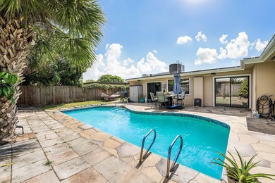 4BR/2BA single-family home with 1,707 sq. ft. under air. This - photo 11