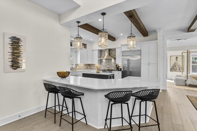 Coastal elegance just steps from the Gulf! 407 Petrel Ave blends - photo 12